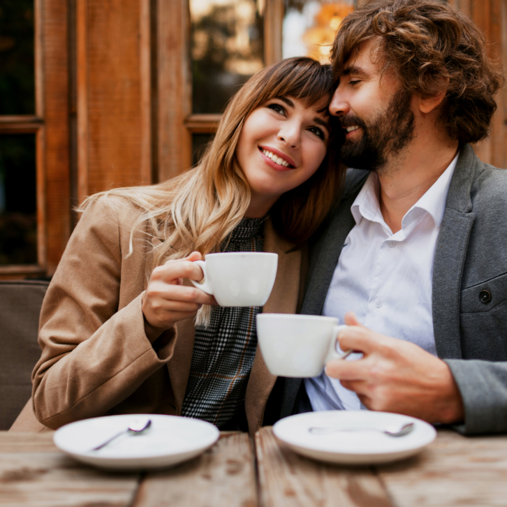 The couple is drinking coffee